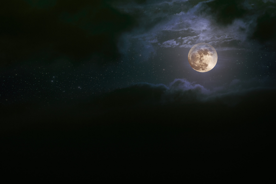 Illustration of an interesting full moon in a cloudy night